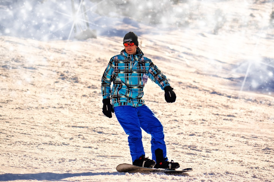Image of a person snowboarding