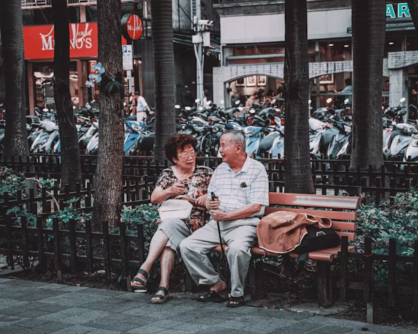 A couple is sitting together
